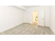 Bright bedroom with neutral carpet and open doorway to the adjacent bathroom at 11392 Gammel Pl, Fishers, IN 46040