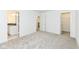 Bright bedroom with white walls, and a modern bathroom visible through an open doorway at 11392 Gammel Pl, Fishers, IN 46040