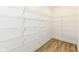 Walk-in pantry with ample shelving provides efficient and organized storage, keeping your kitchen clutter-free at 11392 Gammel Pl, Fishers, IN 46040