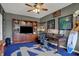 Well-appointed office with custom built-ins, hardwood floors, and stylish decor at 11551 Buckskin Dr, Zionsville, IN 46077