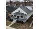 Charming home featuring a cozy front porch and well-maintained landscaping at 1216 N Holmes Ave, Indianapolis, IN 46222