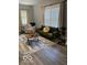 Cozy living room featuring neutral walls, lots of natural light, and a comfortable seating arrangement at 1216 N Holmes Ave, Indianapolis, IN 46222