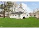 Home's rear exterior set on a sprawling lawn, perfect for outdoor activities and relaxation at 1407 Hannibal St, Noblesville, IN 46060