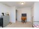 Cozy bedroom with a wooden desk, neutral dresser, and natural light creating a warm and functional space at 1407 Hannibal St, Noblesville, IN 46060