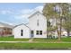 Charming two-story home with inviting front porch and well-manicured lawn at 1407 Hannibal St, Noblesville, IN 46060