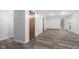 Unfinished basement with neutral paint, laminate flooring, and lots of room for storage or recreation at 1512 Tipton Ln, Columbus, IN 47201