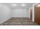 Expansive basement featuring durable laminate flooring and versatile open space for various uses at 1512 Tipton Ln, Columbus, IN 47201