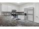 Kitchen featuring white cabinets, stainless steel appliances, and attractive backsplash and countertops at 1512 Tipton Ln, Columbus, IN 47201