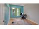 Office/bedroom with blue accent wall and wood floor at 15433 Wandering Way, Noblesville, IN 46060