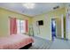 Cozy bedroom with a window view and laminate flooring at 15433 Wandering Way, Noblesville, IN 46060