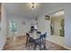 Open dining area with wood floors, connecting to the kitchen and living spaces at 15433 Wandering Way, Noblesville, IN 46060