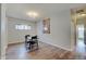 Cozy dining area with wood floors and a modern light fixture at 15433 Wandering Way, Noblesville, IN 46060