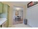 Cozy dining area, open to kitchen, featuring modern appliances and cabinetry at 15433 Wandering Way, Noblesville, IN 46060