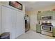 Functional kitchen with stainless steel appliances and ample cabinet space at 15433 Wandering Way, Noblesville, IN 46060