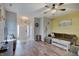 Bright living room with wood floors and ample seating at 15433 Wandering Way, Noblesville, IN 46060