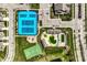 Aerial view of community amenities, including tennis courts, swimming pool, and basketball court at 15679 Woodford Dr, Westfield, IN 46074