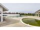 Community swimming pool with ample deck space and views of surrounding homes at 15679 Woodford Dr, Westfield, IN 46074