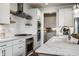 Gourmet kitchen featuring stainless appliances, marble counters, gas range and eat in kitchen at 15679 Woodford Dr, Westfield, IN 46074
