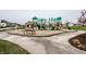 Neighborhood playground featuring various play structures and a soft surface for safety at 15679 Woodford Dr, Westfield, IN 46074