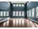 Bright studio featuring hardwood floors, large windows, and a full mirror at 15679 Woodford Dr, Westfield, IN 46074