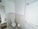 Clean bathroom offers a toilet, and plenty of space, with practical layout and essential amenities at 1627 E 8Th St, Anderson, IN 46012