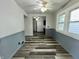 View of the dining area featuring modern flooring and two-tone walls, great for meals at 1627 E 8Th St, Anderson, IN 46012