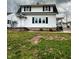 Charming two-story home with a classic design and inviting front porch at 1627 E 8Th St, Anderson, IN 46012