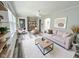 Inviting living room with stylish decor and hardwood floors, perfect for entertaining or relaxing at 1627 E 8Th St, Anderson, IN 46012