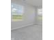 Bright bedroom with two windows offering a scenic view at 16441 Mount Logan Rd, Noblesville, IN 46060