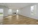 Bright living room with a modern fireplace, recessed lights and wood floors at 16441 Mount Logan Rd, Noblesville, IN 46060