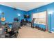 Bedroom with exercise equipment and bright blue walls at 16963 Southall Dr, Westfield, IN 46074