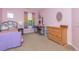 Bright bedroom featuring a bed, a desk, and a dresser at 16963 Southall Dr, Westfield, IN 46074