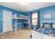 Bright bedroom featuring a bunk bed, a desk, and ample space for activities at 16963 Southall Dr, Westfield, IN 46074