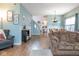 Comfortable living room with hardwood floors leading into an open floorplan at 16963 Southall Dr, Westfield, IN 46074