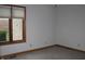 Bedroom with gray carpet, window with blinds, and neutral colored walls and trim at 1915 Barbie Ct, Franklin, IN 46131