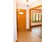 Inviting foyer with gleaming tile flooring, a wood front door, and an entry to the hardwood living room at 1915 Barbie Ct, Franklin, IN 46131