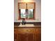 Kitchen sink features updated faucet, granite countertops and modern appliances at 1915 Barbie Ct, Franklin, IN 46131