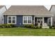 Spacious backyard featuring a covered patio, perfect for outdoor entertaining at 19668 Mcdonald Pl, Westfield, IN 46074