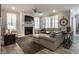 Cozy living room with fireplace, plush sofa, and stylish decor at 19668 Mcdonald Pl, Westfield, IN 46074