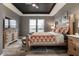 Spacious main bedroom featuring a tray ceiling, luxury furniture and large windows at 19668 Mcdonald Pl, Westfield, IN 46074