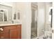 Stylish bathroom featuring a marble countertop vanity and glass-enclosed shower at 2004 Caledonian Ct, Greenwood, IN 46143