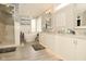 Spa-like bathroom with free-standing tub, glass shower, and modern vanity at 2004 Caledonian Ct, Greenwood, IN 46143