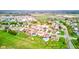 Scenic aerial view of houses near pond, with well-kept lawns and fields, perfect for outdoor activities at 20107 Marie Ct, Noblesville, IN 46062