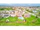 An aerial view captures a backyard with a private pool and well-maintained lawn, perfect for outdoor enjoyment and relaxation at 20107 Marie Ct, Noblesville, IN 46062