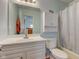 Bright bathroom featuring a vanity, toilet, and bathtub with shower at 20107 Marie Ct, Noblesville, IN 46062