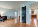 Spacious living room featuring laminate flooring, neutral paint, and bright natural light at 20107 Marie Ct, Noblesville, IN 46062