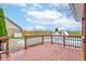 Wooden deck with stained railing overlooking backyard at 20107 Marie Ct, Noblesville, IN 46062