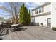 A view of the backyard with a table and chairs on a wooden deck at 203 Winslow Dr, Westfield, IN 46074
