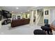 A well-lit basement bar with furniture, decor, television, and staircase to upper level at 203 Winslow Dr, Westfield, IN 46074