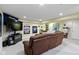 Finished basement featuring a large sectional sofa and sports memorabilia on the walls at 203 Winslow Dr, Westfield, IN 46074